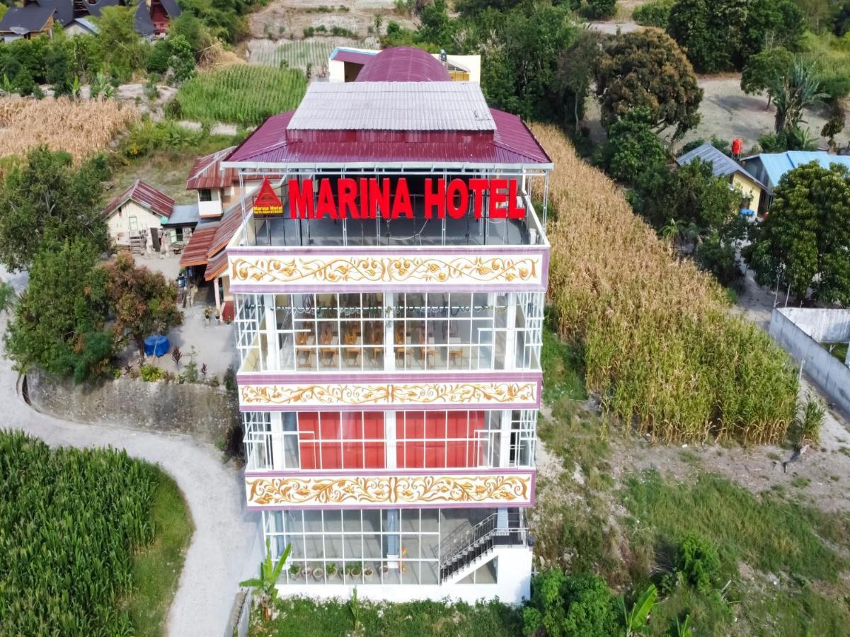 Oyo 3215 Marina Hotel Sinapuran Bagian luar foto